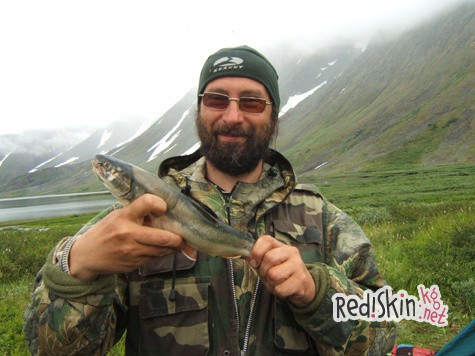 С крестом, веслом и удочкой